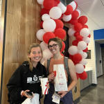 students holding chick-fil-a bag